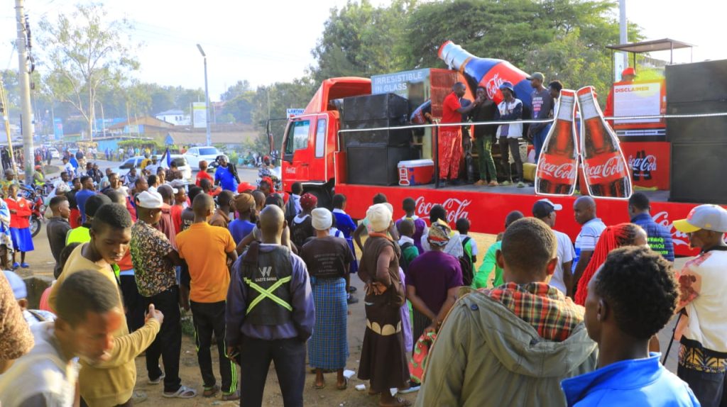 Residents storm Bungoma town streets to celebrate the Returnable Coca-Cola Glass Bottle. PHOTO/TONY WAFULA
