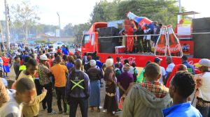 Residents storm Bungoma town streets to celebrate the Returnable Coca-Cola Glass Bottle. PHOTO/TONY WAFULA