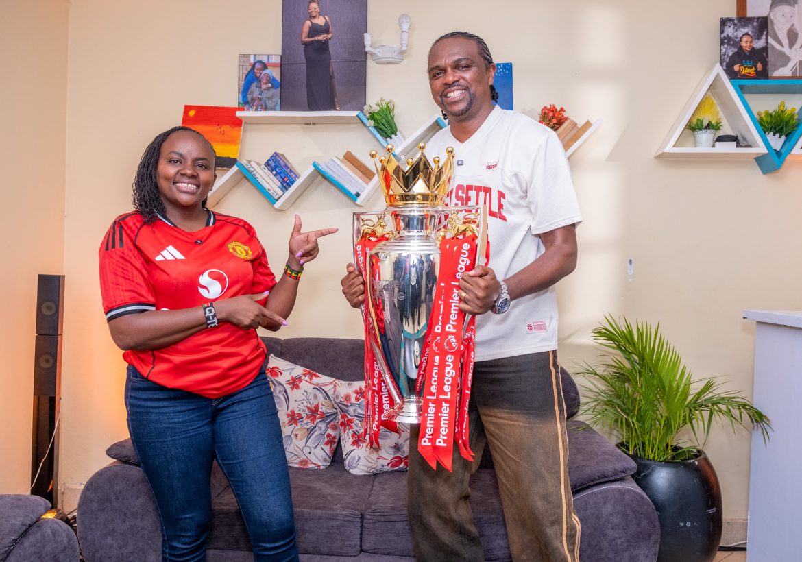 Man United fan Ann Njoroge hosts the Premier League Trophy and former Arsenal player Nwankwo Kanu at her home