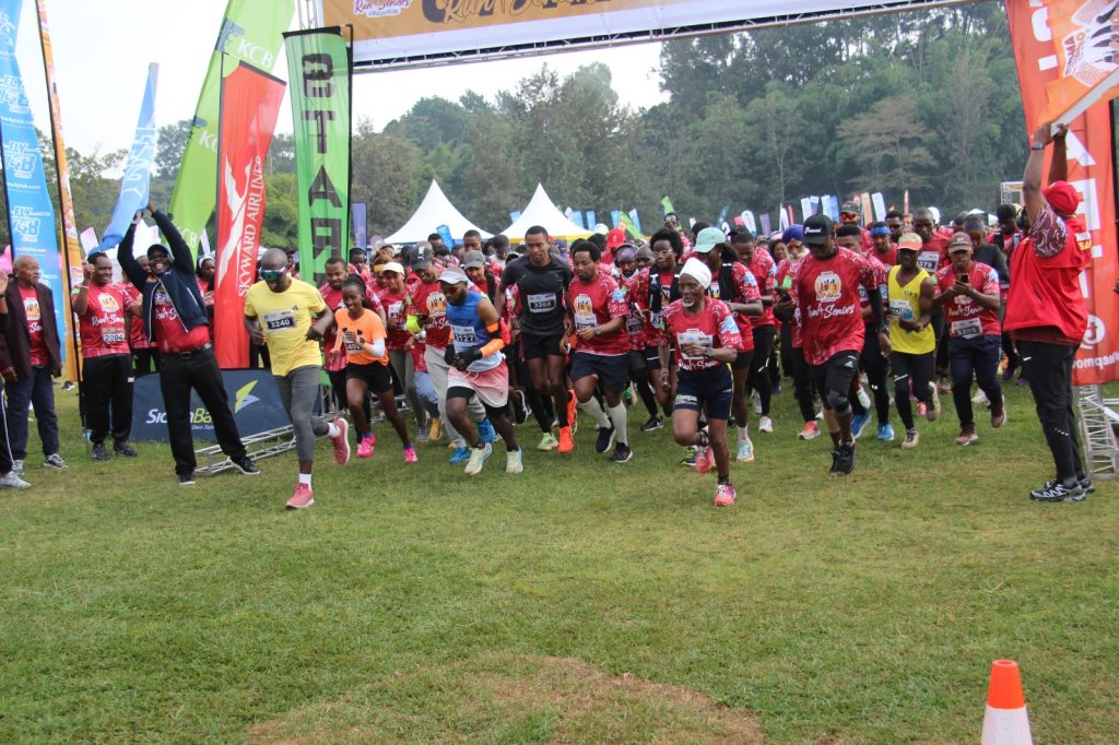 Participants run during the second edition of the Run 4 Seniors charity event organized by Mama Ibado Charity